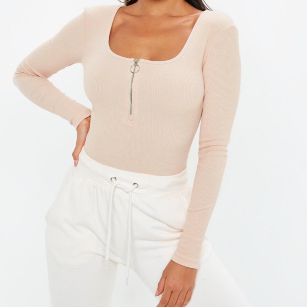 Pink zip front long sleeve bodysuit